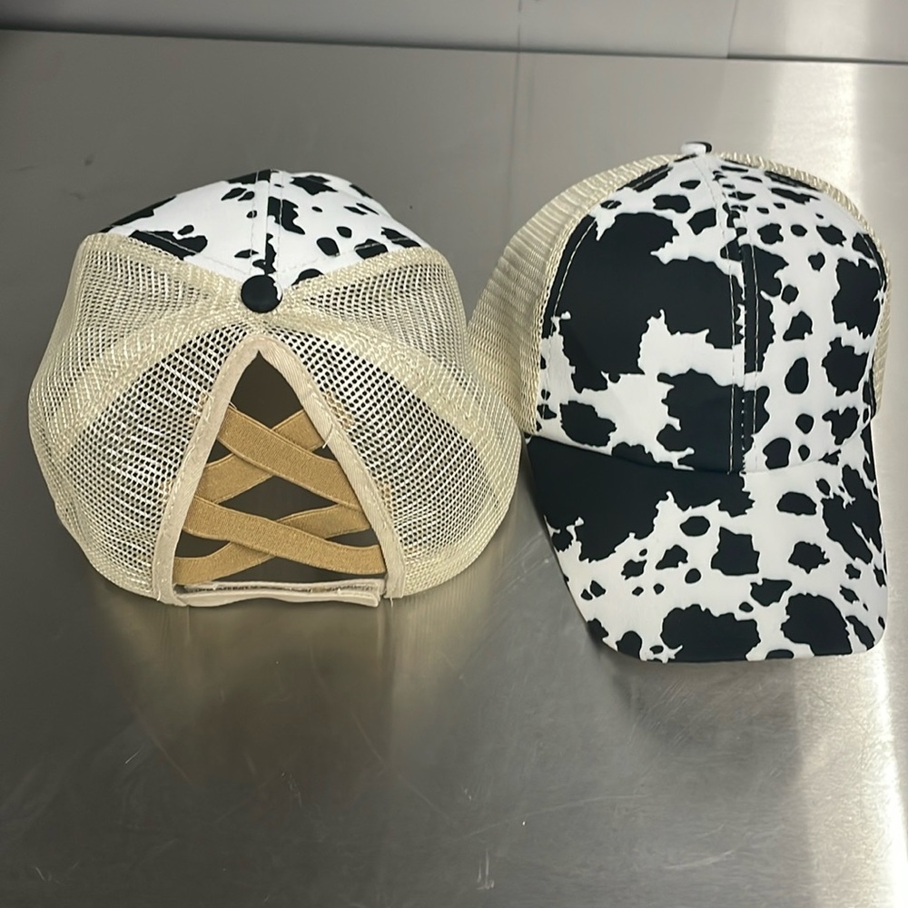 Crisscross ponytail, baseball cap with cow print